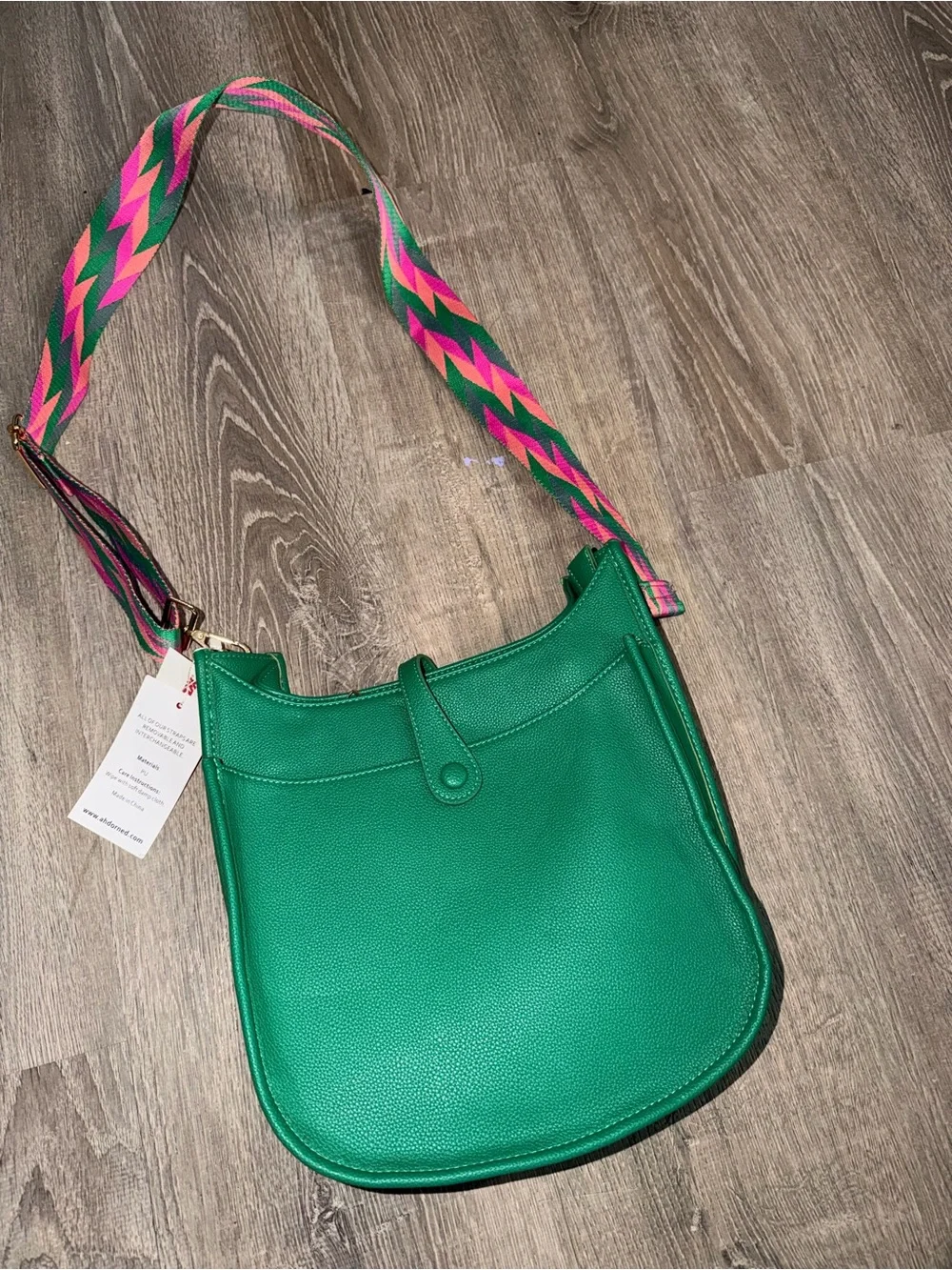 Vibrant Green Crossbody Bag with Multicolor Woven Strap
